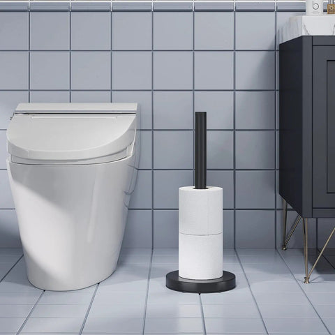 Free Standing Toilet Paper Holder Stand In Matte Black, Built From 304 Stainless Steel, shown in a bathroom setup holding rolls.