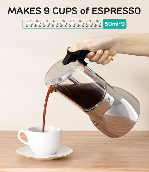 Pouring espresso from Stovetop Moka Pot For 9 Cups Espresso Maker 15oz Italian Coffee Clear Glass And Stainless Steel Base Silver Finish 450ml Capacity Easy Brew For Rich Cafe Quality Shots At Home into a cup