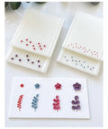 Four Bead Sizes Polymer Clay Bead Roller Kit with Bead Maker and Molds for Clay Crafting on white surface
