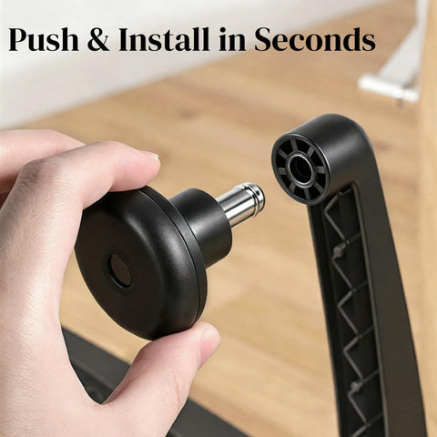 Close-up of hand installing a black bell glide, part of Set Of 5 Premium Bell Glides For Office Chair Caster Replacement Convert Rolling Casters To Stationary Feet Universal Fit For Desk Chairs Stop That Wobble And Stay Steady.