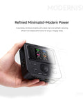 Person holding Quad Channel 40W RC Battery Charger and Discharger with XT60 Output, compact design for FPV drones.