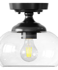 Industrial Semi Flush Mount Ceiling Light With Clear Glass Shade And Matte Black Finish, ideal for modern farmhouse interiors.