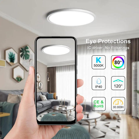 12 Inch Ultra Thin LED Flush Mount Ceiling Light Fixture Daylight White 5000K in modern living room, image reflecting via smartphone