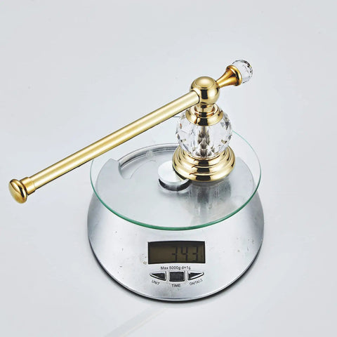 Crystal Gold Toilet Paper Holder For Modern Bathrooms Wall Mounted Zinc Alloy Tissue Hanger on scale showing 243 grams