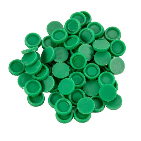 Pile of small green circular felt pads for furniture protection or craft projects