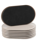 Stack of heavy furniture sliders for carpets 9.5 by 5.75 inches in beige, reusable moving sliders for heavy couches and tables.