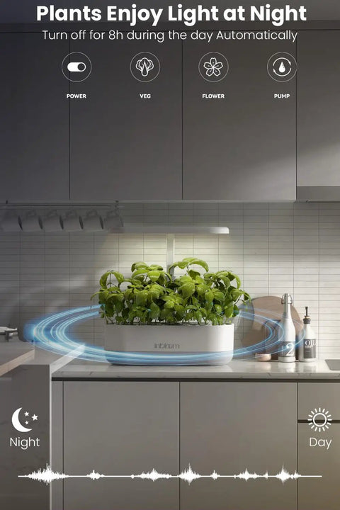 12 Pod Hydroponics Indoor Garden System with LED grow light on kitchen counter, showing green plants under adjustable light.