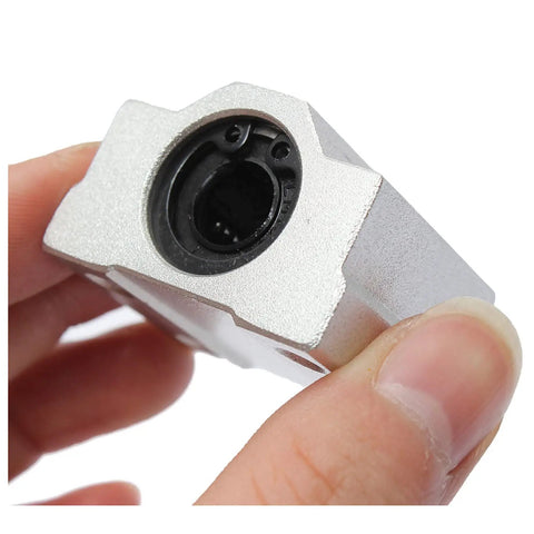 Heavy Duty 4Pack SCS10UU 10mm Linear Motion Ball Bearing Slide Bushing Block Crafted From Sleek Aluminum Alloy, showcasing inner view.