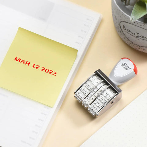 Slick 1.5 Inch Rubber Line Dater Stamp Featuring Quick Twist Dial Calendar Spanning Twelve Consecutive Years on office desk.