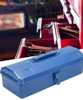 Heavy Duty Iron Toolbox With Extended Telescopic Handle Built Tough For Working Crews And Weekend Home Repair Tasks Blue Metallic Storage Container on a workshop bench.