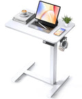 Yolezo 24 By 16 Inch Electric Overbed Table With Rolling Wheels and Smooth Height Adjustment, white desk with laptop and coffee.