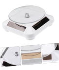 Solar Powered Rotating Display Turntable For Jewelry Phones And Accessories Lightweight Compact Electric Showcase Stand With Good Load Capacity, top view showing clear surface.