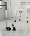 Press On Rubber Foot Pads For Furniture Legs Set Of 4 No Slip Replacement Tips shown on bathroom floor with walker