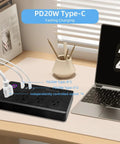 Zigbee Smart Power Strip Surge Protector With Fast Charging And Four Independently Switched Outlets Syncs With Alexa Google Home Philips Hue Black Slick Hub powered gear on a desk.