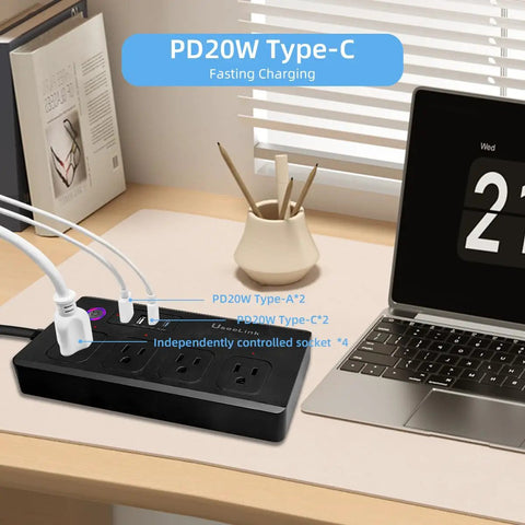 Zigbee Smart Power Strip Surge Protector With Fast Charging And Four Independently Switched Outlets Syncs With Alexa Google Home Philips Hue Black Slick Hub powered gear on a desk.