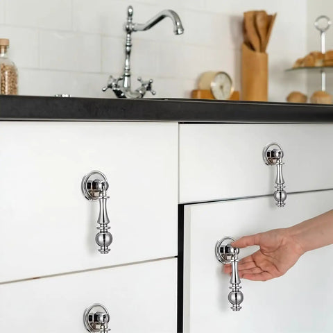Hand opening kitchen drawer with Vintage Drop Cabinet Pulls Polished Nickel Zinc Alloy Retro Dresser Knobs