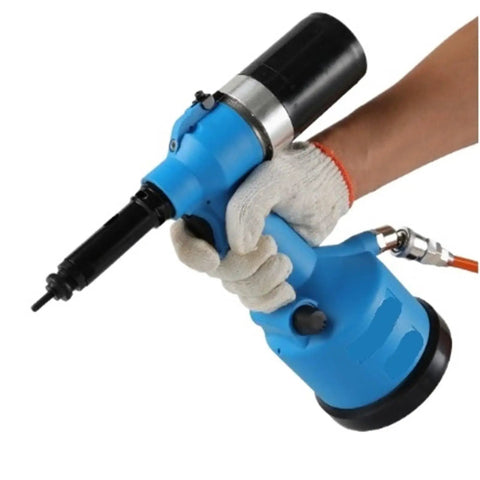 Hand holding a blue Heavy Duty Pneumatic Air Rivet Gun Pulling No Sweat One Click Auto Tension Lock for upholstery work.