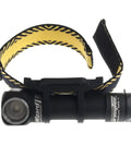 Side view of Wizard Pro V3 XHP50 Warm USB Magnetic Headlamp With 2300 Lumens Beast Brightness 108 Meter Throw, black headlamp with yellow strap.