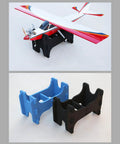 RC plane on black Double Slot RC Aircraft Foam Stand For Gas Powered And Electric Planes, with blue and black brackets displayed.
