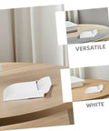 White desktop monitor riser on a wooden table with versatile display setup.