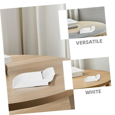 White desktop monitor riser on a wooden table with versatile display setup.