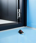 Spring Loaded Push Button Latch Kit For Cabinets, Zinc Alloy Door Catch, shown near black cabinet door for easy install.