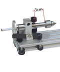 Heavy Duty Mini Lathe With Polishing And Grinding Capabilities For Metal And Woodworking Projects Adjustable Speed Control 12 To 24V Input Compact Design close-up of the lathe's headstock with a 3cm measuring line.
