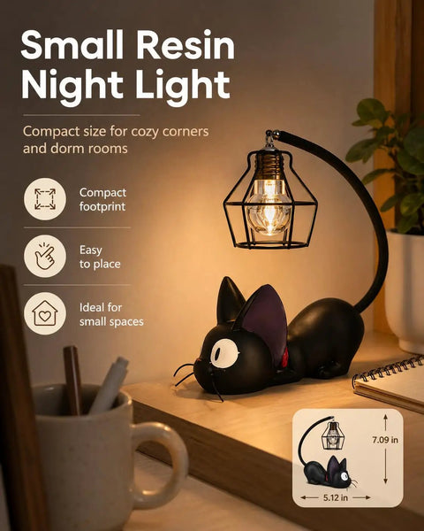Kiki Jiji Cat Lamp Resin Night Light with warm glow on a desk, compact resin design, ideal for cozy corners and dorm rooms.