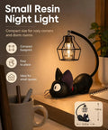 Jiji Black Cat Night Light Inspired by Kiki's Delivery Service, Cozy Resin Desk Bedside Lamp on a wooden desk