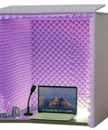 Portable Soundproof Booth Featuring Heavy Duty Foldable Acoustic Foam Panels For Desktop Microphones And Knock Down Background Noise To Bag Crystal Clear Vocals On The Fly Straight From The Box Effortless Desk Setup with purple foam and laptop.
