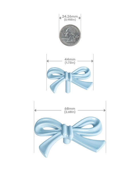 Blue Bow Dresser Knobs 4 Pack Small Decorative Cabinet Drawer Pull Handles For Girls Bedroom And Nursery Decor Two Size Options With Screws And Washers Included Easy To Install Vintage Cute Home Hardware, showing two knobs with size comparisons