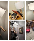 Robot Bedside Lamp with fabric shade and foldable solid wood body on desk and shelf, toy style decor with flexible arms.