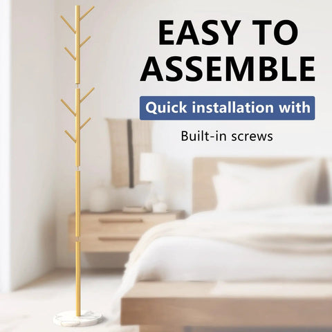 Heavy Duty Coat Rack With Natural Marble Base And Gold Metal Finish Freestanding Eight Hook Coat Tree in bedroom setup