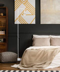 Dope 70 Inch Matte White Floor Lamp With In Line On Off Foot Switch in a modern bedroom next to a bed and ottoman.