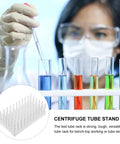 Heavy Duty Test Tube Rack With Peg Drying Layout For Reliable Centrifuge And Microtube Holding Two Pack on a lab bench with colorful liquids.