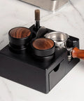 Slick Coffee Tamper Holder Portafilter Stand Tight Tamping Station Organizer For Home Baristas Built From Food Grade Abs with black finish and wooden tamper tops.