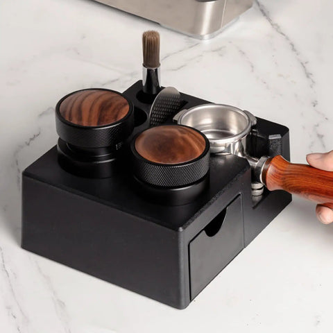 Slick Coffee Tamper Holder Portafilter Stand Tight Tamping Station Organizer For Home Baristas Built From Food Grade Abs with black finish and wooden tamper tops.