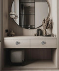 Modern vanity with 4 pack self adhesive stainless steel drawer knobs brushed silver cabinet handles installed, reflecting in mirror.