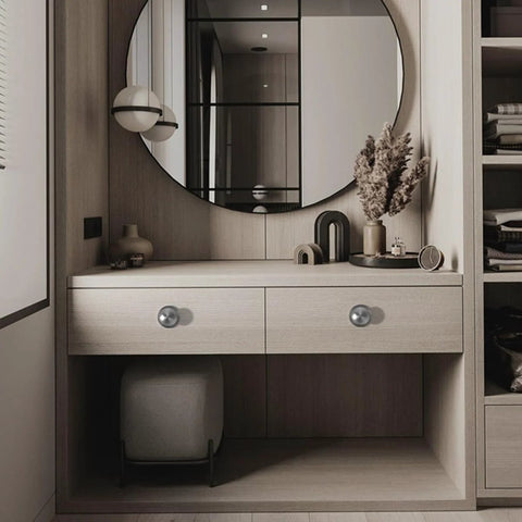 Modern vanity with 4 pack self adhesive stainless steel drawer knobs brushed silver cabinet handles installed, reflecting in mirror.