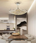Modern Crystal Chandelier Pendant Light With Silver Finish, 25 Inch Ceiling Fixture above dining table in elegant room