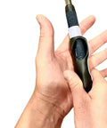 Left Handed Golf Grip Trainer Golf Swing Aid Attachment in hand, showing grip correction tool on a standard golf club shaft.