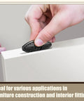 Inserting Set Of 160 Size 20 Black Plastic Biscuit Joiners With Self Clamping Gripping Plates into wood groove