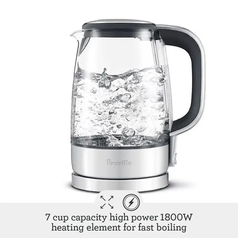Crystal Clear Glass Electric Kettle With German Schott Glass Soft Opening Lid Gentle Steam Release Ergonomic Handle BPA Free Auto Shut Off Boil Dry Protection Easy Pour Fast Boil For Breakfast Tea And Coffee in action with boiling water