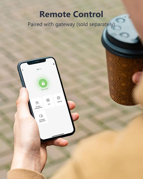 User holding smartphone displaying remote control app for No Sweat Keyless Entry Smart Deadbolt With Fingerprint Scanning App Control.