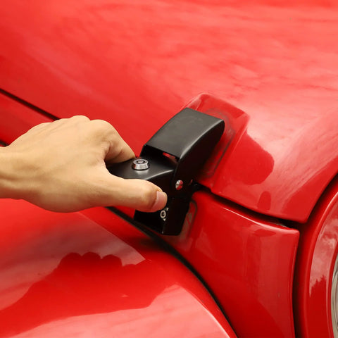 Hand securing Aluminum Hood Latch Locking Kit For Jeep Wrangler JK JL Gladiator JT 2007 Through 2023 on red vehicle