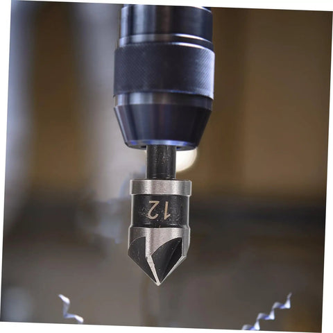 Close-up of a drill with a chamfer bit from the 5 Piece Countersink Drill Bit Set For Woodworking And Metal Fabrication With Pro Grade Precision Chamfering Tools Versatile Deburring Kit For Carpentry Projects And Metalworking Tasks.