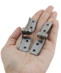 Hand holding 2 Pack Stainless Steel Torque Shaft Hinges With Adjustable Torque And 90 Degree Damping Locking Action, Left And Right Set, 66mm Shaft