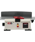 Heavy Six Inch Benchtop Jointer with helical carbide head and adjustable fence for precision woodwork.