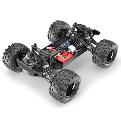 Exposed chassis of Volcano One Sixteenth Scale RC Monster Truck With Four Wheel Drive, LED Headlights, 2.4GHz Radio, Li-ion batteries