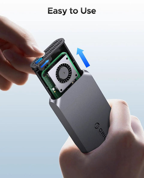 Hand holding open No Sweat 40Gbps M2 NVMe SSD Enclosure Rock Solid Aluminum Housing With Auto Thermostat Cooling Fan.